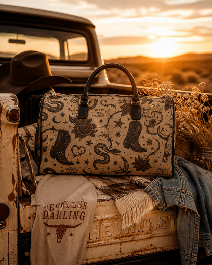 Golden Hour Travel Bag – Tattoo-Style Cowboy Boot & Snake Weekender