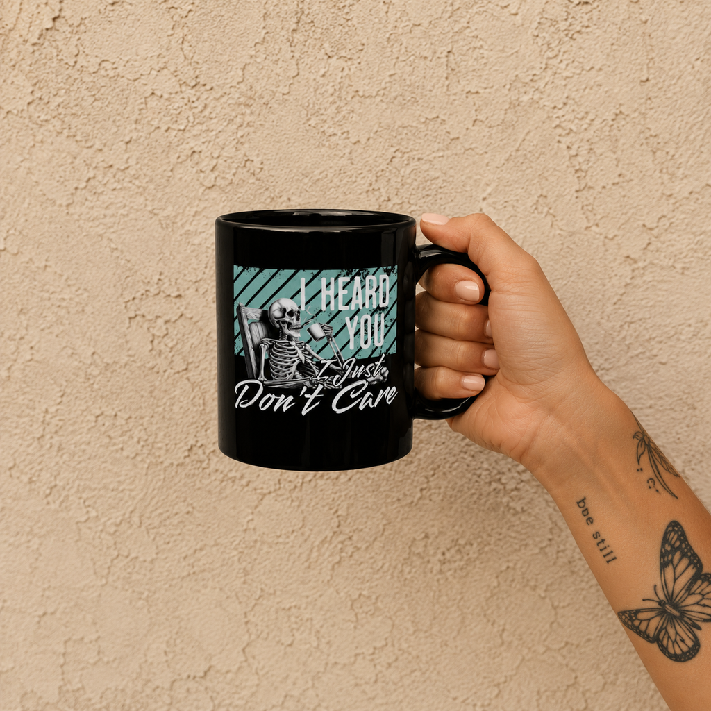 Black Ceramic Mug — "I Heard You I Just Don't Care" Skeleton Graphic (11oz/15oz)