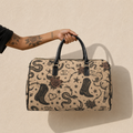 Golden Hour Travel Bag – Tattoo-Style Cowboy Boot & Snake Weekender
