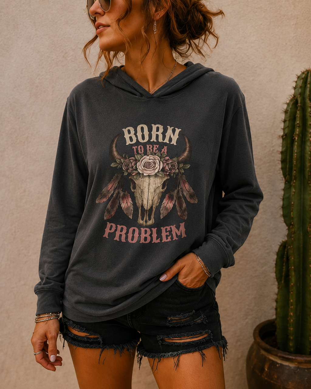 Born to be a Problem Long-Sleeve Hooded Tee — Western Skull & Feather Graphic